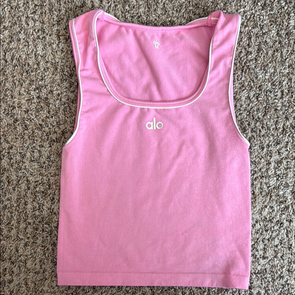 A tank. Medium but fits like a small.